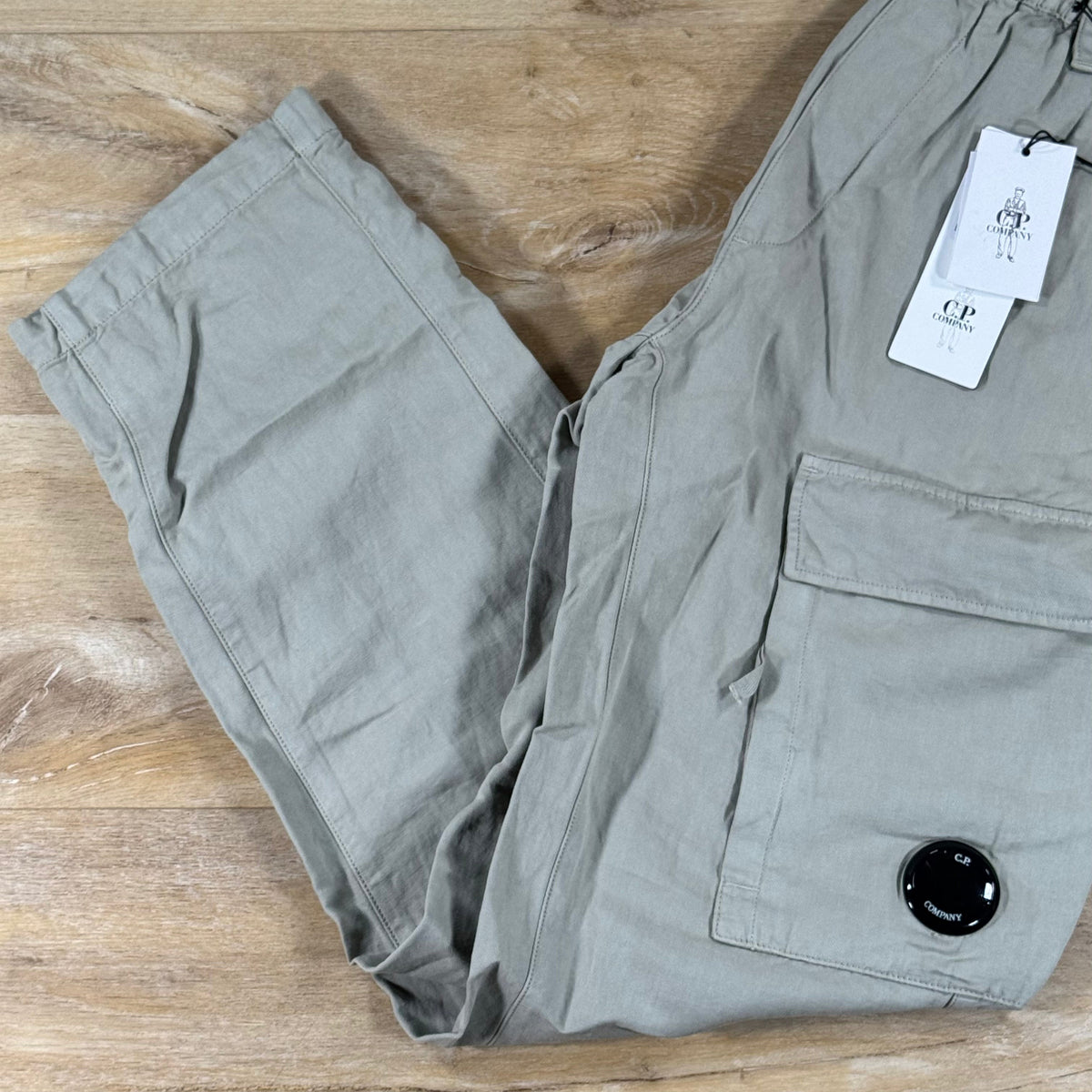 C.P. Company Cotton Linen Elasticated Lens Cargo Pants in Dove