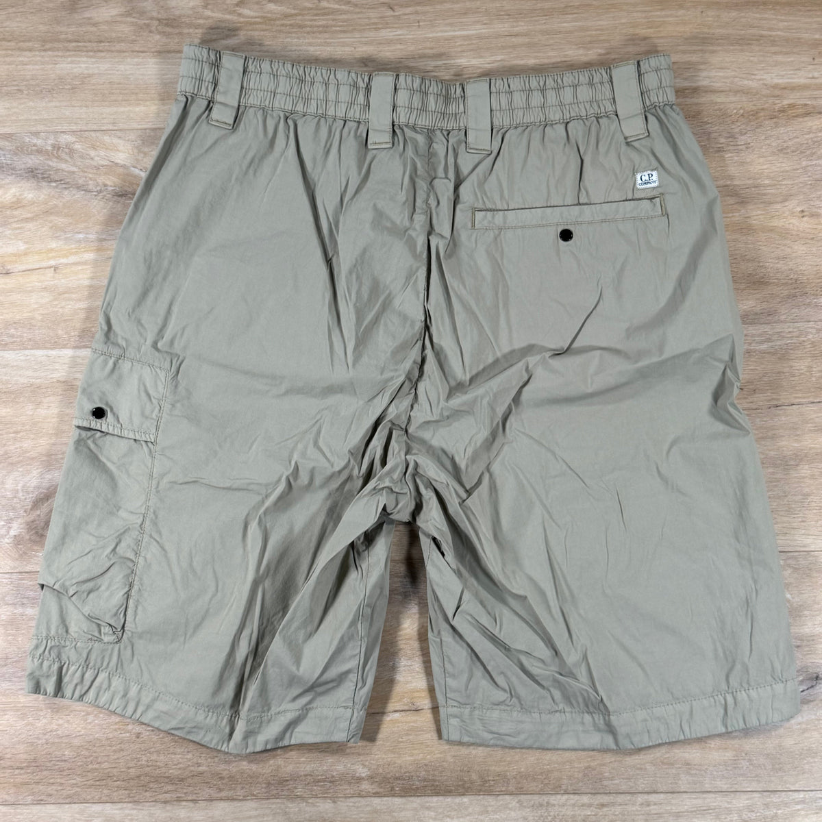C.P. Company 50 Fili Stretch Loose Lense Cargo Shorts in Moss Gray - Green