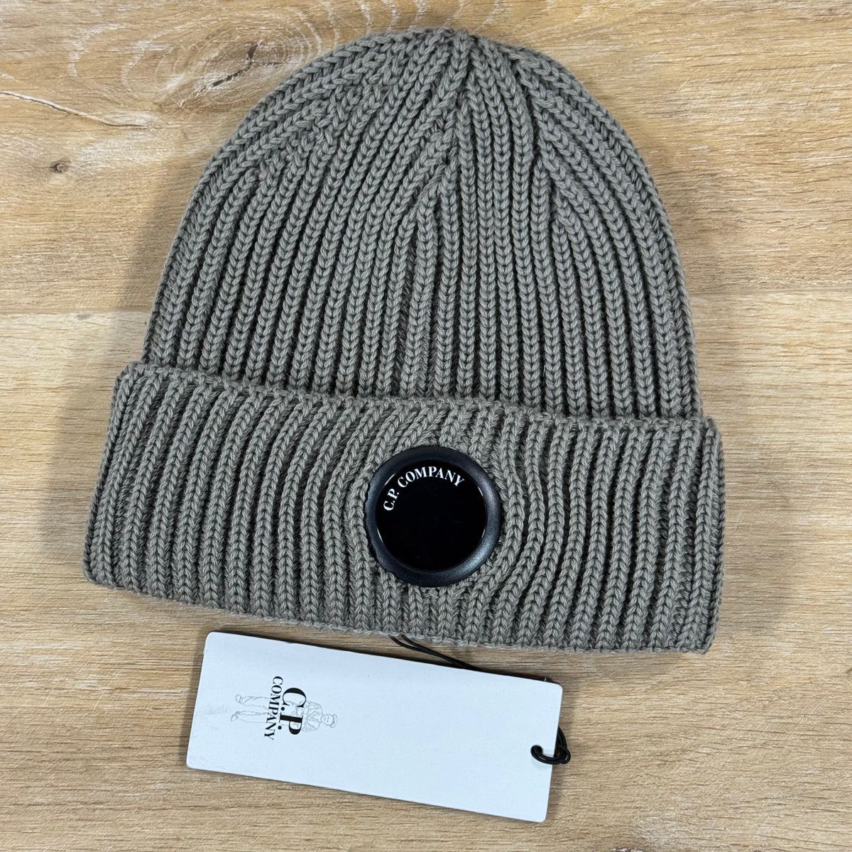 C.P. Company Extra Fine Merino Wool Lens Beanie in Fallen Rock - Beige