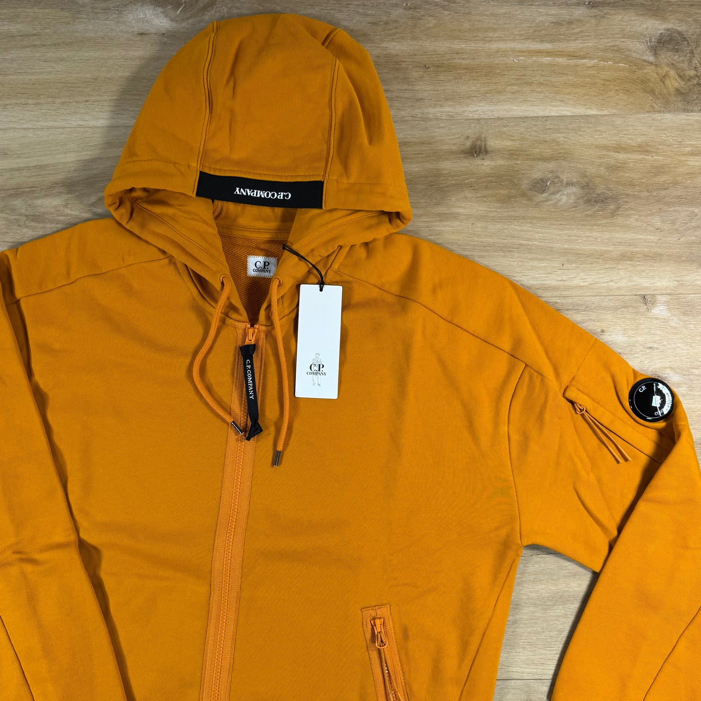 C.P. Company Diagonal Raised Zipped Lens Hoodie in Desert Sun