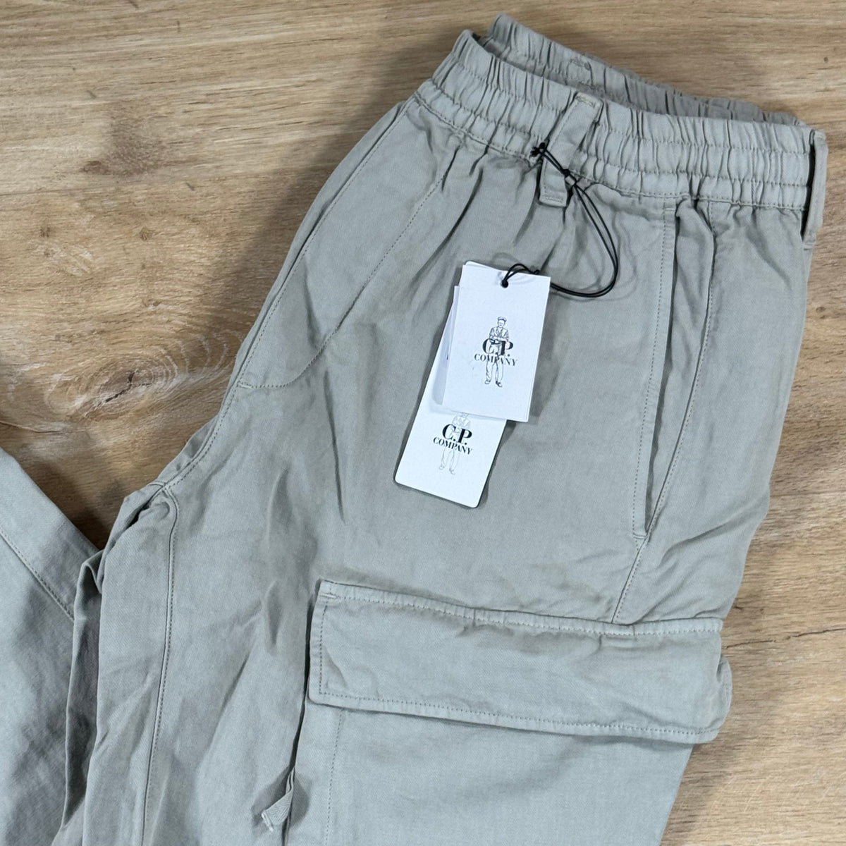 C.P. Company Cotton Linen Elasticated Lens Cargo Pants in Dove