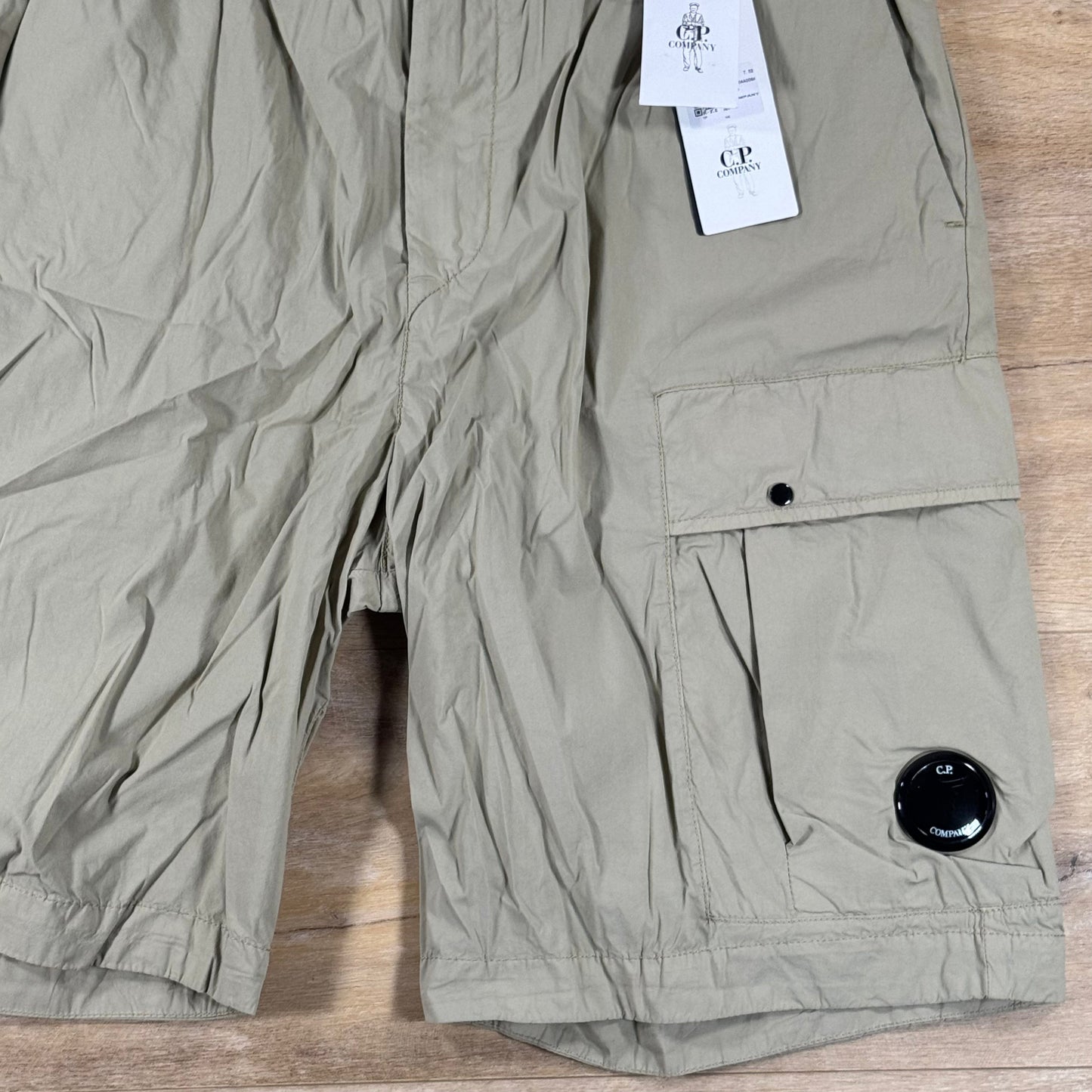C.P. Company 50 Fili Stretch Loose Lense Cargo Shorts in Moss Gray - Green
