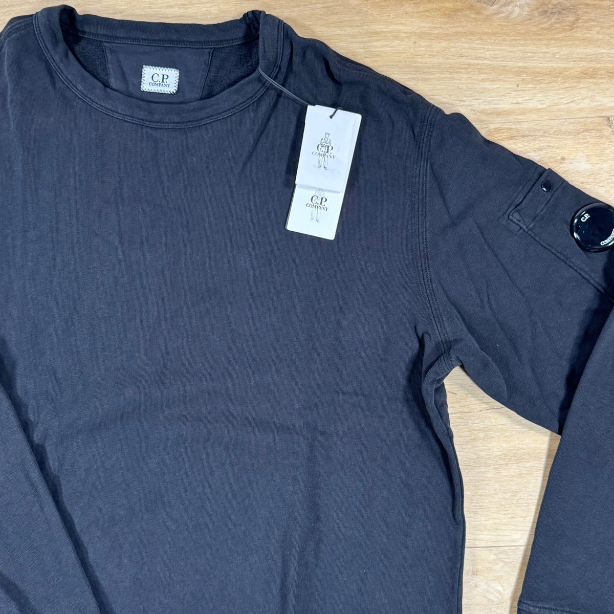 C.P. Company Malfile Fleece Lens Crewneck Sweatshirt in Black