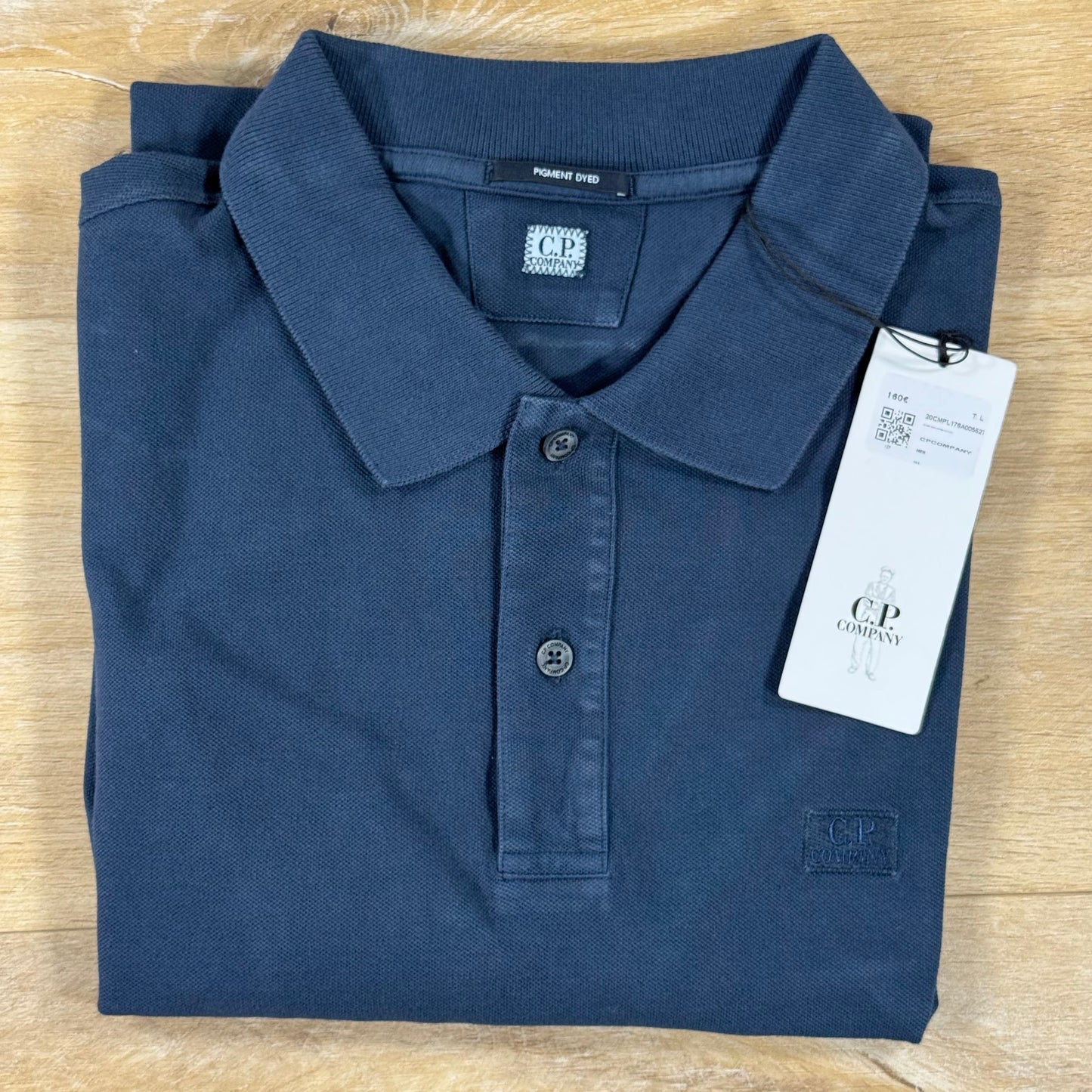 C.P. Company Pigment Dyed Polo Shirt in Midnight Navy