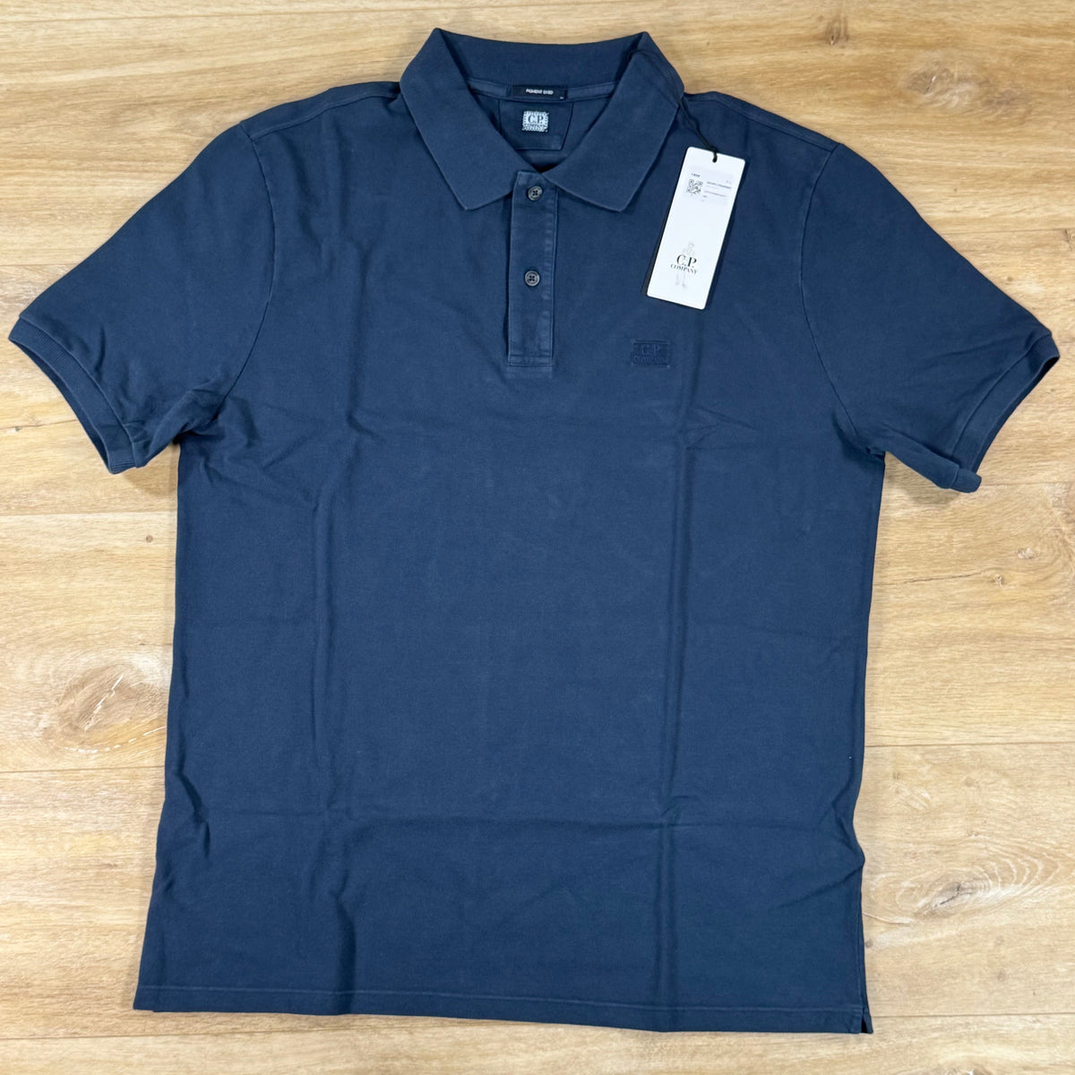 C.P. Company Pigment Dyed Polo Shirt in Midnight Navy