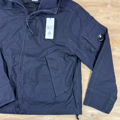 C.P. Company Twill Hooded Lens Jacket in Navy