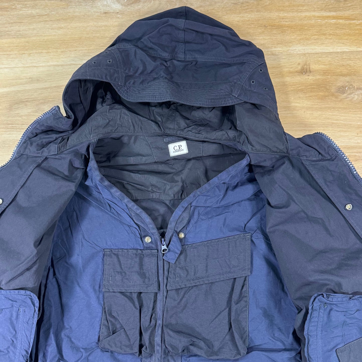 C.P. Company Twill Hooded Lens Jacket in Navy