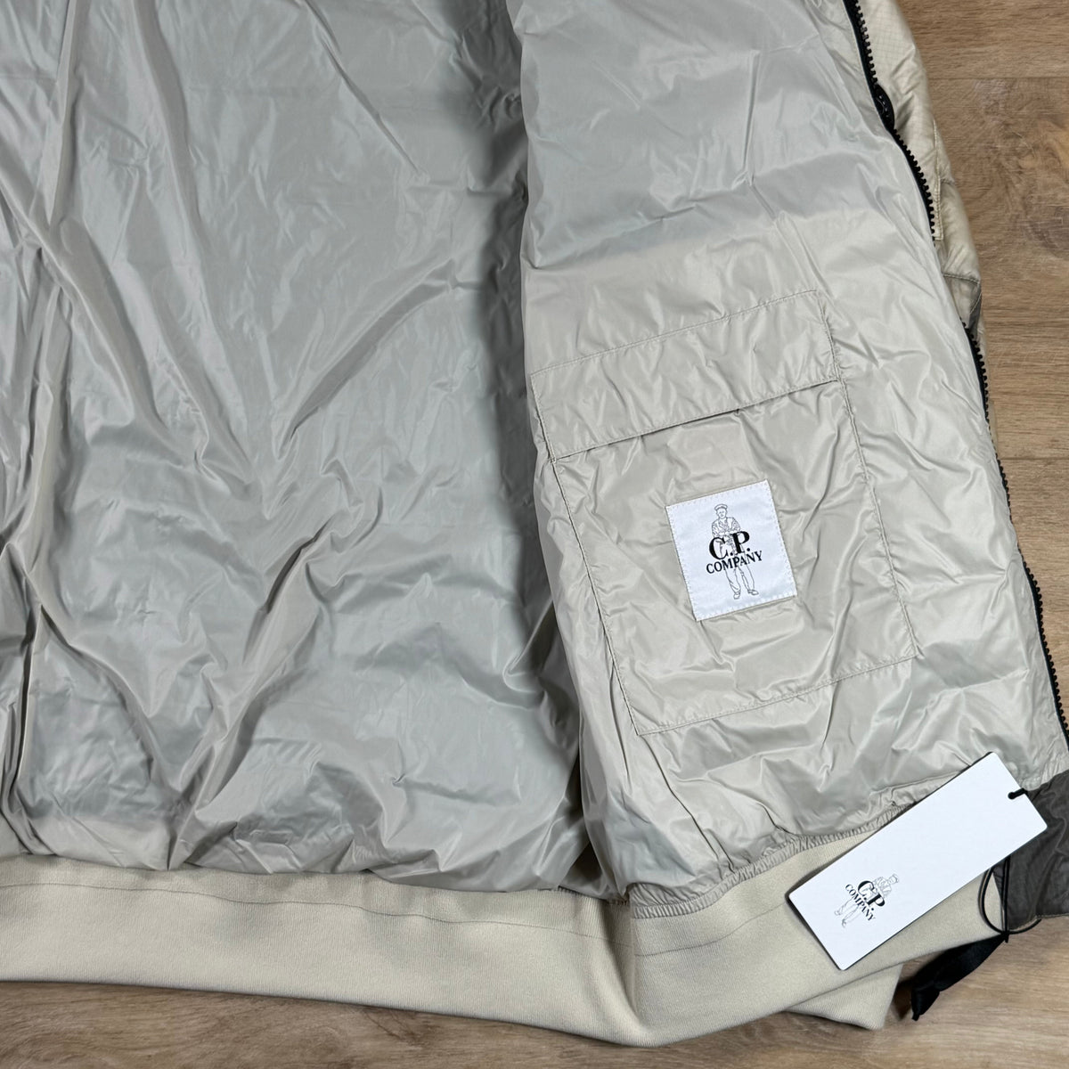 C.P. Company D.D. Shell Hooded Lens Down Jacket in Silver Birch