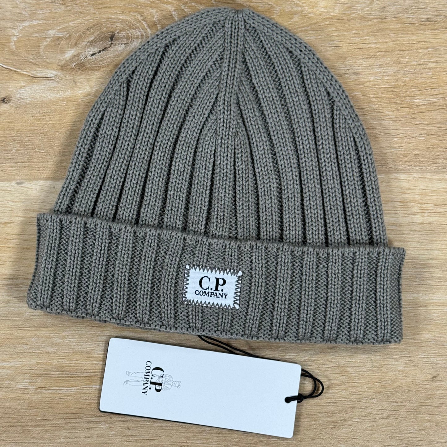 C.P. Company Extra Fine Merino Wool Logo Beanie in Fallen Rock - Beige