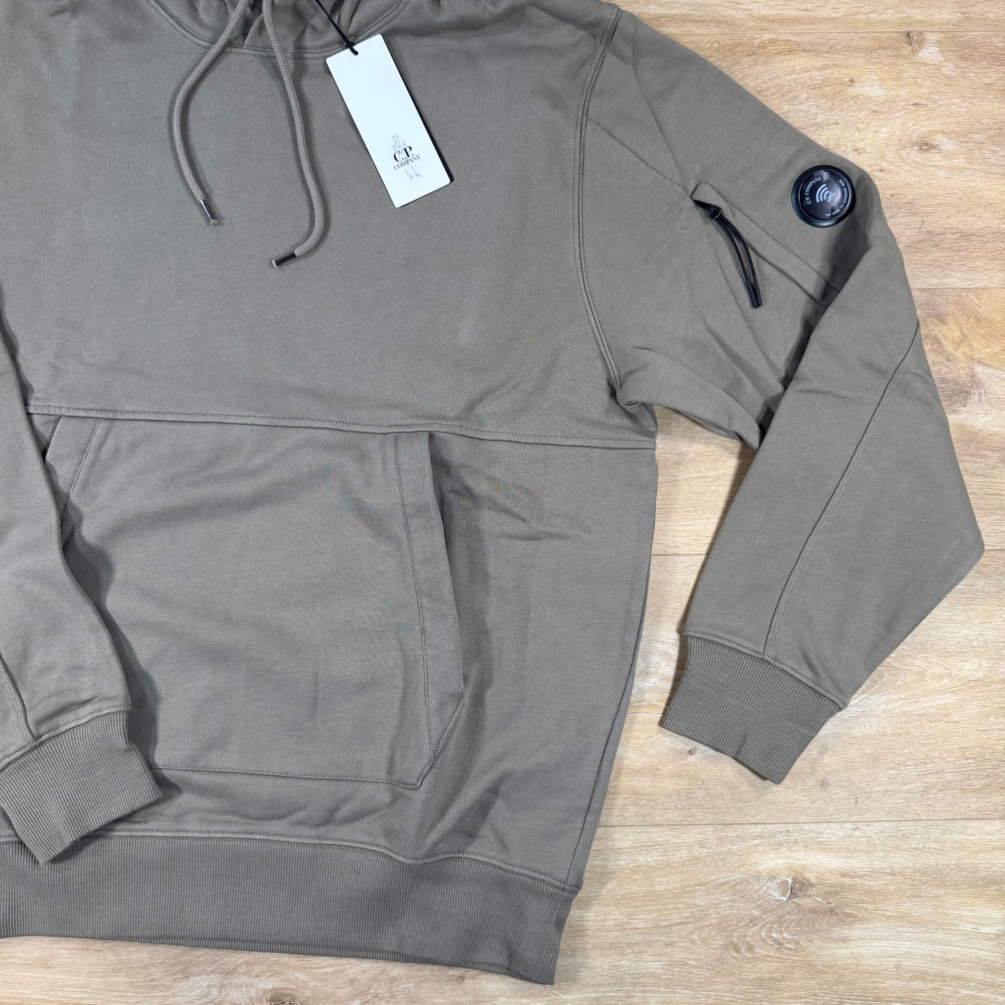 C.P. Company Diagonal Raised Fleece Lens Hoodie in Fallen Rock - Beige