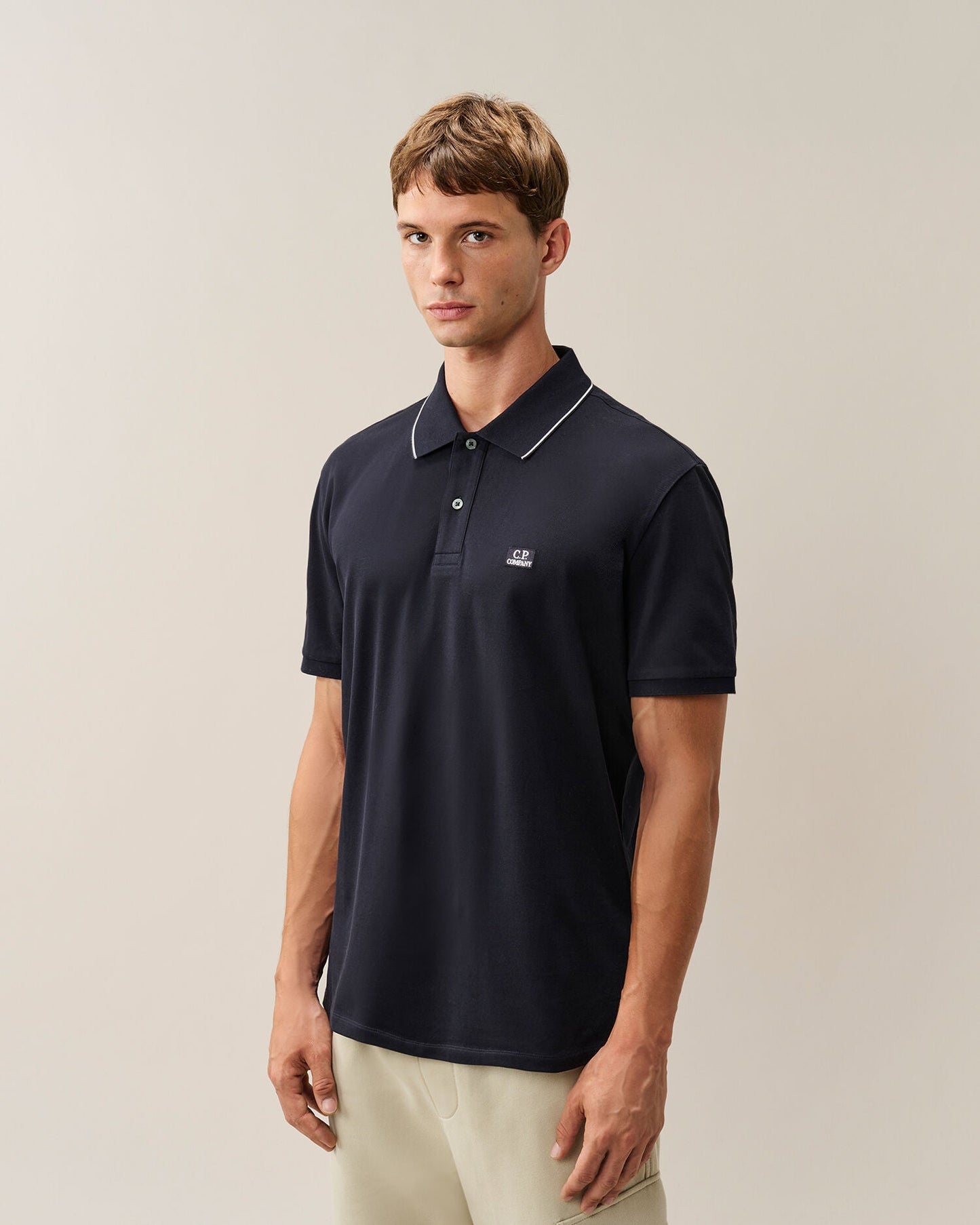 C.P. Company Stretch Piquet Striped Collar Polo Shirt in Navy