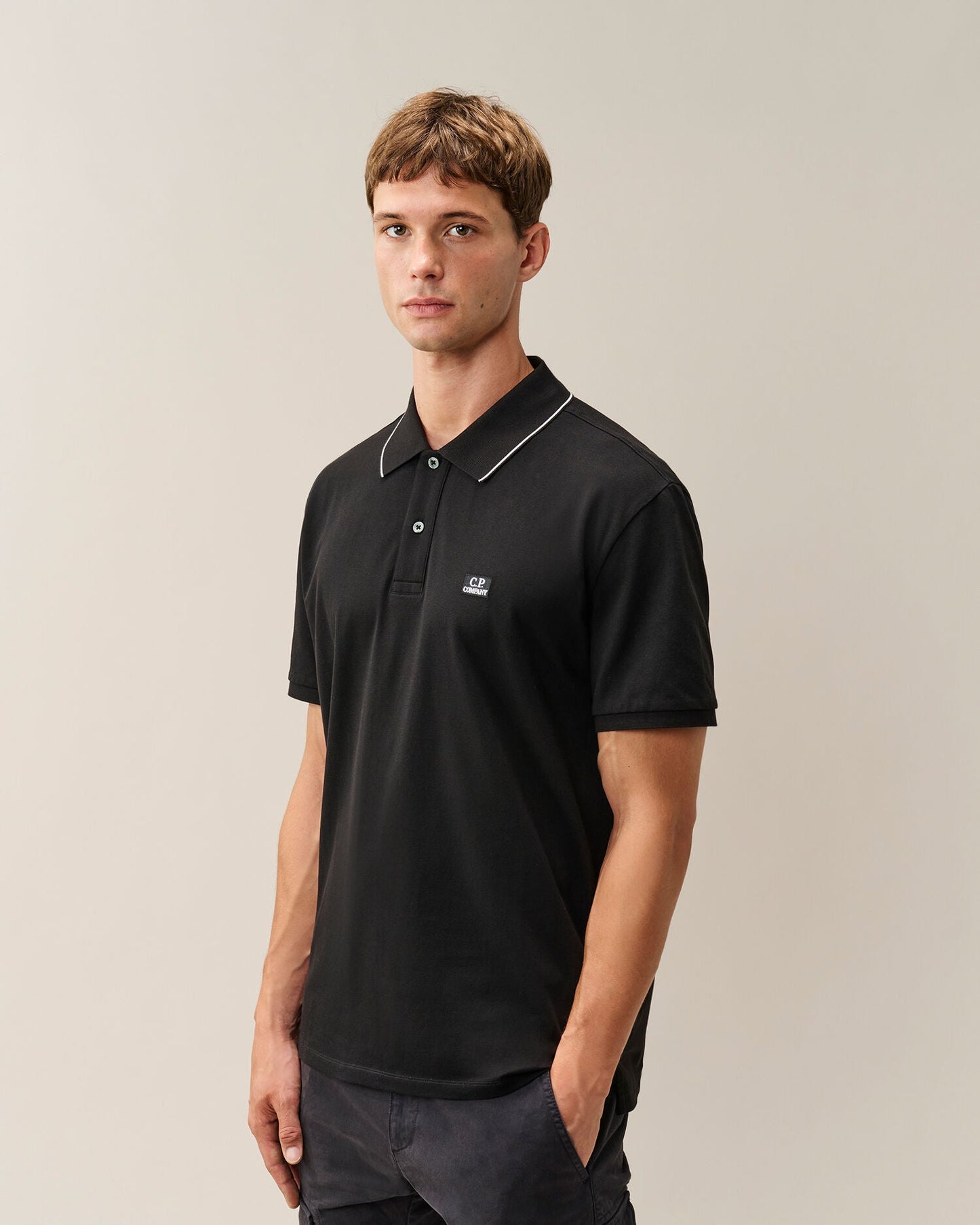 C.P. Company Stretch Piquet Striped Collar Polo Shirt in Black