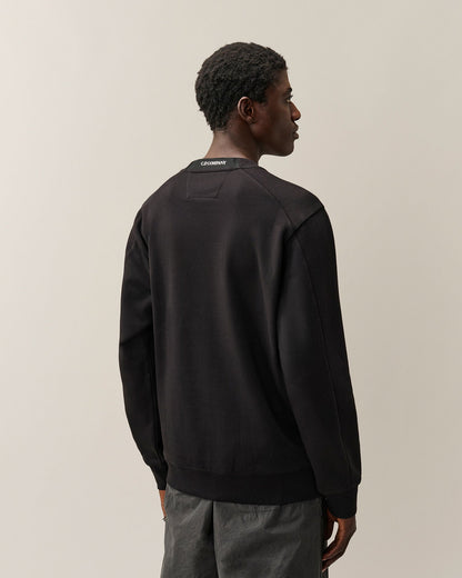 C.P. Company Diagonal Raised Fleece Crewneck Lens Sweatshirt in Black