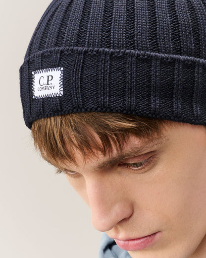 C.P. Company Extra Fine Merino Wool Logo Beanie in Navy